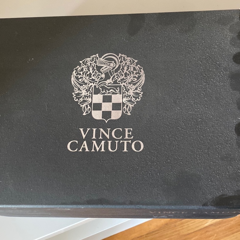 Bone colored high heels with silver spikes